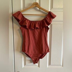 Stretchy bodysuit off the shoulder